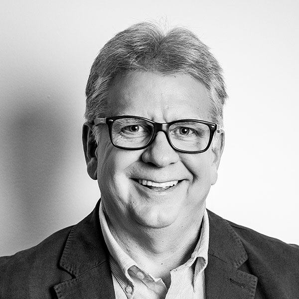 Headshot of Greg Allen